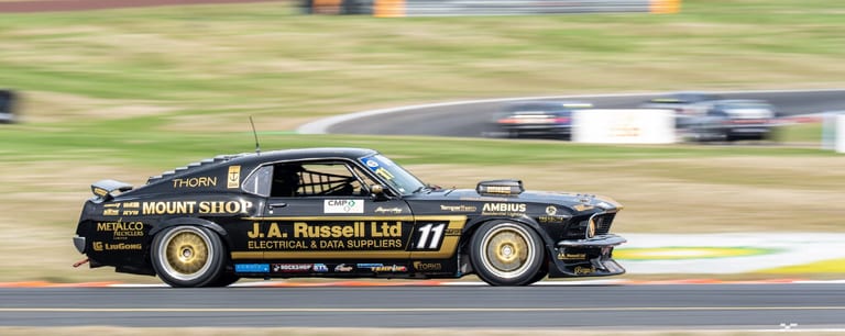 Classic car racing at Taupō Motorsport Park — motorsport photography by Ryan Watkinson