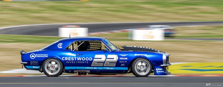 Classic car racing at Taupō Motorsport Park — motorsport photography by Ryan Watkinson